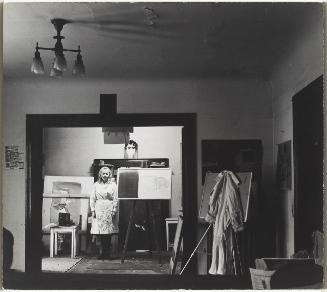 Joyce Wieland (standing in her studio)