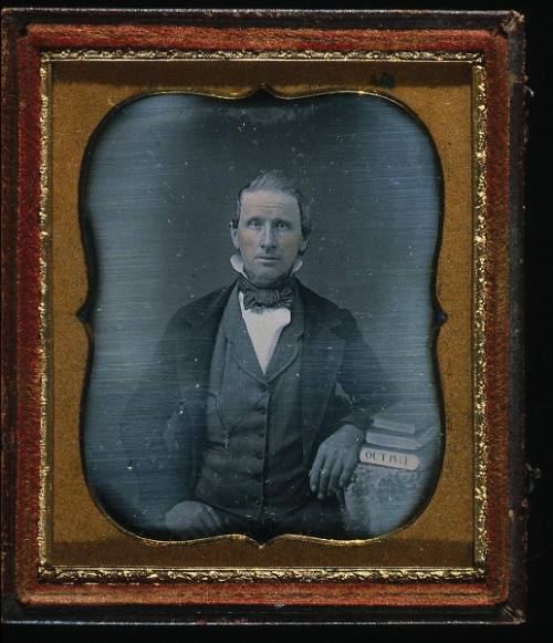 Portrait of a Man (with bow tie and books)