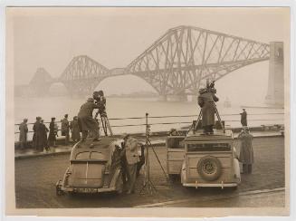 News Reel Boys on the Job in Firth of Forth Air Raid.
