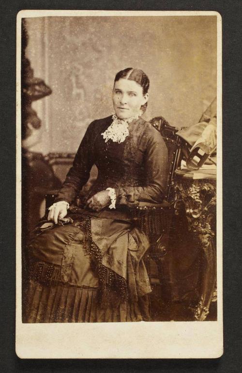 Unknown sitter [portrait of a seated woman on armchair]