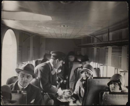 The interior of one of the "Golden Ray" air liners, in which meals can be served. It has a cruising speed of 110mph., and is faster than anything yet used on the Paris-London route.