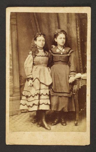 Unknown sitters [portrait of two girls standing]