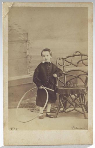 Portrait of a boy with a hoop