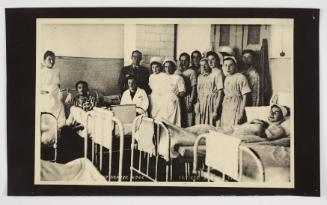 Group portrait of nurses and patients with Dr. Kagan