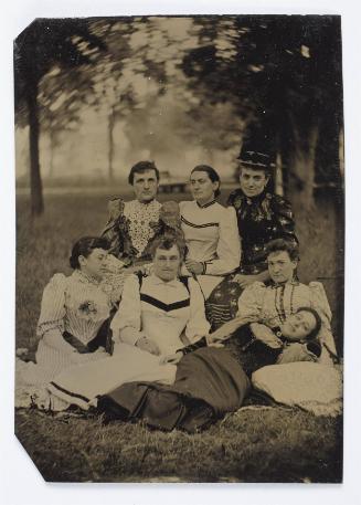 Group of seven women and men (cross-dressed)