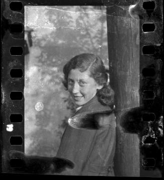 Young woman looking back