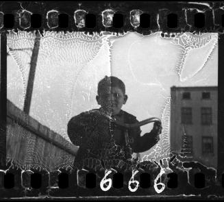 Portrait of a boy with a bike