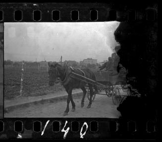 Horse-drawn wagon carrying residents being deported from the ghetto