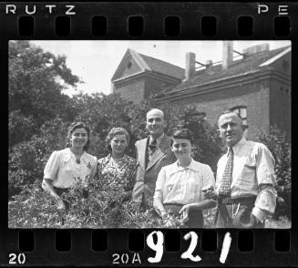 Two men with three women