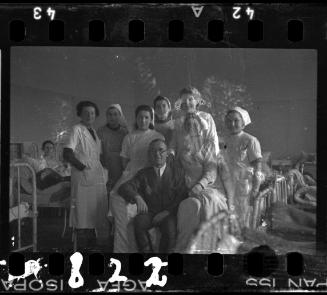 Group portrait of Dr. Kagan and nurses in the hospital