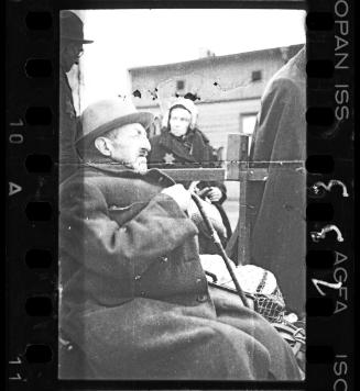 An elderly man with cane being deported to Chelmno nad Nerem death camp, Lodz Ghetto