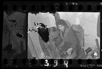 Young woman working in a workshop in the ghetto