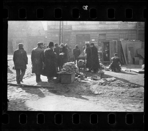 Residents selling furniture and wooden scraps for firewood