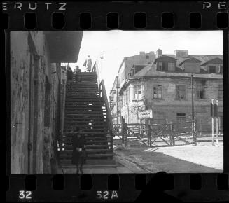 View of stairs leading to a ghetto bridge