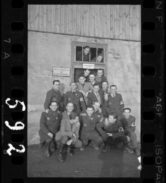 A group of Jewish police outside a food distribution station in Marysin