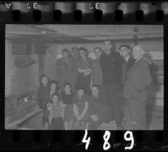 Administrators and employees inside the bakery