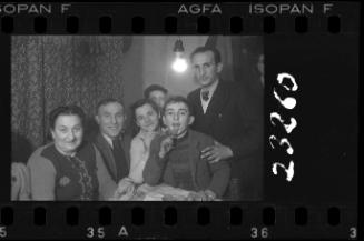 Group of six residents at a social gathering in the ghetto
