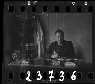 Administrator sitting at a desk