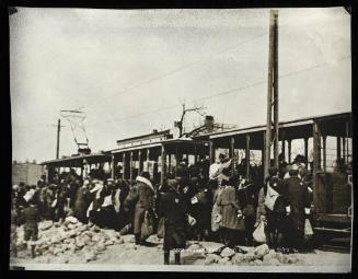 Boarding tram for deportation