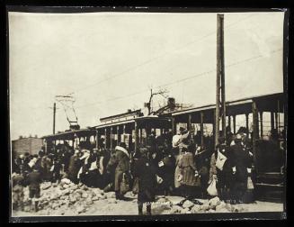 Boarding tram for deportation