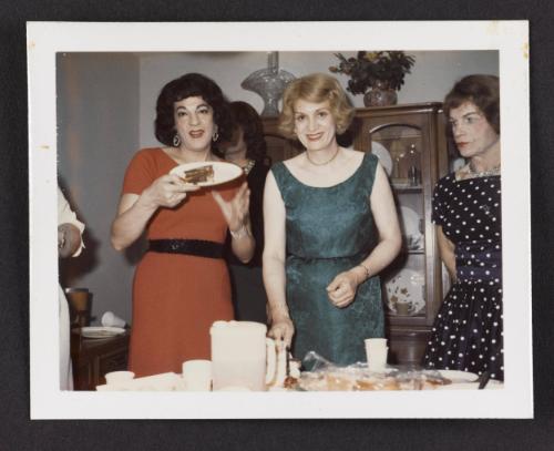 [Susanna, Joan, and friend with cake, location unknown]

