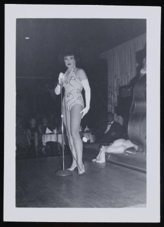[Performing in a sequin outfit and long white gloves, location unknown]
