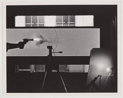 silhouette gun firing