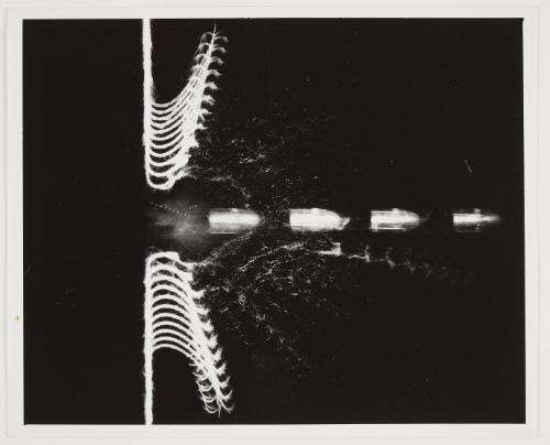 .22 cal. bullet cuts a string