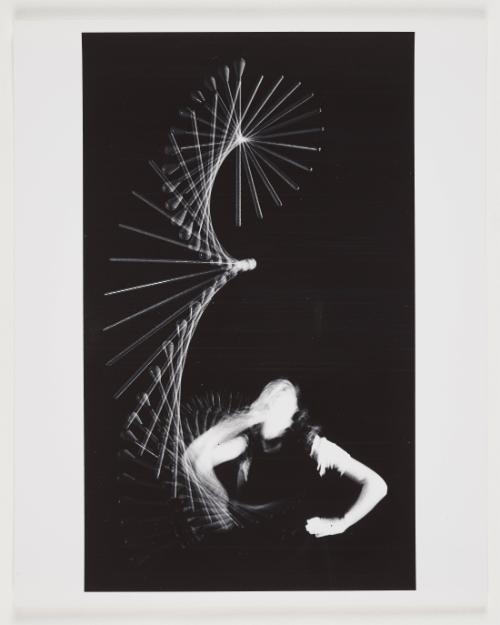 baton toss (hands on hips)