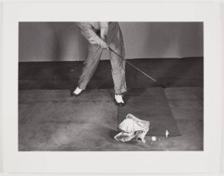 Driving Golfball thru Telephone Book