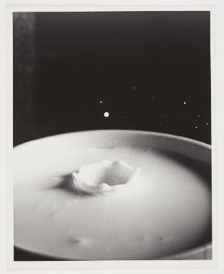 Milk Drop into Cup