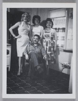 [Susanna, Edith, and Marie with a man holding a cable release, Chevalier d’Éon, Hunter, NY]
