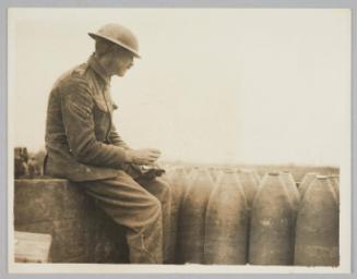[British Corporal Checking Shells on a Light Railway, Wytschaete, 11 August 1917]