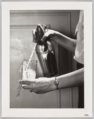 3306 (Selzer bottle and over flowing glass)